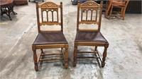 Set of two carved wood chairs