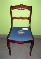 Carved back needlepoint chair