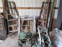 2 wooden ladders-hose reels-saw horses-etc