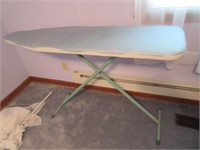vintage green metal ironing board