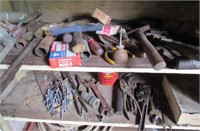 bucket of old tools in the barn & small vise