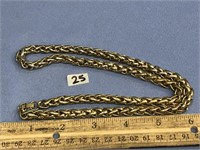 A thick braided gold tone chain necklace, approx.