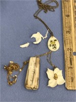 Two necklaces, Ivory platchet scrimmed with a flow