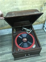 An antique Victrola, in very good condition, unkno