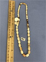 18" fossilized ivory graduated bead necklace