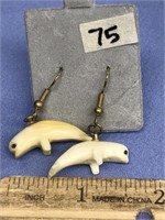 Pair of fossilized ivory carved whale shaped earri