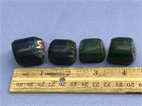 Four old trade beads, two blue and two green