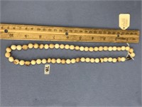 fossilized ivory bead necklace Approx. 20" long