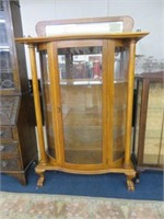 OAK COLUMNED AND LIGHTED CURIO CABINET WITH