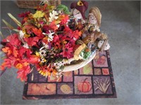 fall decorations: flowers -scarecrows -basket -rug