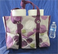 thirty-one purple bag with 8 rolls of toilet paper