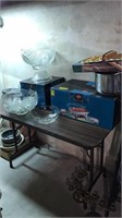 Chafing dishes and punch bowl and party supplies
