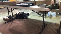 Two plastic 6 foot folding tables and one 4 foot
