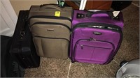 Three carry-on suitcases