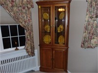 Oak corner cabinet with leaded  glass doors -
