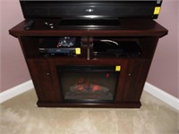Mahogany TV stand with electric fireplace
