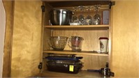 Cabinet full of kitchenware pyrex baking dishes