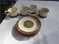 Four Denby cups and saucers