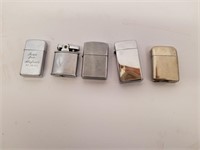 A1- FIVE COLLECTIBLE CIGARETTE LIGHTERS