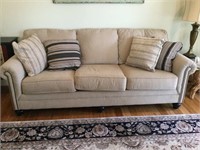 Beige 3 cushion sofa