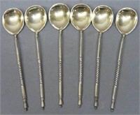 SIX RUSSIAN SILVER AND GOLD WASH TEASPOONS