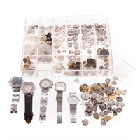 Assortment of watch parts and wrist watches