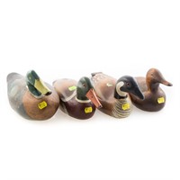 Four carved and painted wood ducks