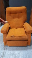 Orange reclining rocking chair