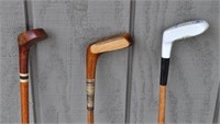 Three Vintage Golf Clubs