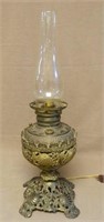 Brass Shell Motif Electrified Oil Lamp.