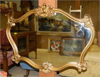 Rococo Gilt Framed Mirror. 28"T x 36"W.