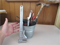 little bucket of assorted hand tools