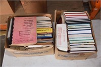 Lot #31 (2) Boxes full of manuals and pottery