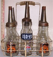 METAL OIL CARRYING CASE WITH 6 BOTTLES OF VARIOUS