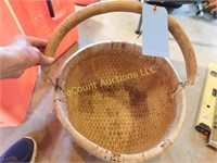 woven basket, wood handle