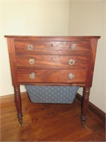 Antique sewing chest on casters