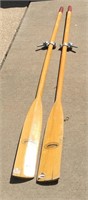 Two FEATER BRAND boat oars each fitted with oarloc
