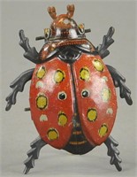 CRAWLING BEETLE PENNY TOY
