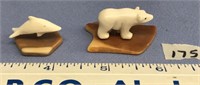 Lot of 2 ivory carvings on fossilized ivory: 1" be