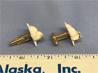 Pair of ivory cufflinks in shape of walrus