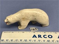 Carved from walrus jawbone, 4.5" long polar bear,