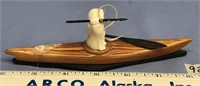 6.5" Wood kayak with an ivory hunter and baleen sp
