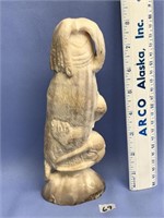 fossilized walrus ivory carving of an Eskimo merma