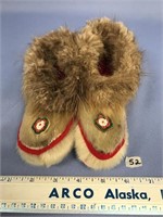 Pair of seal skin child's slippers in new conditio