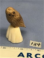 2" Owl carved from fossilized walrus tooth on whit