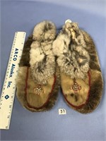 Pair of seal skin beaded slippers, some wear   (k