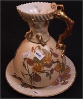 A Royal Worcester pitcher with gold