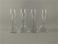 Set of four tall champagne glasses