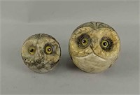 Pair of hand carved owl paper weights
