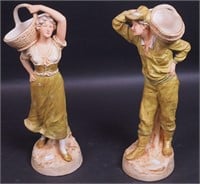 A pair of Royal Dux Bohemian figurines of a man